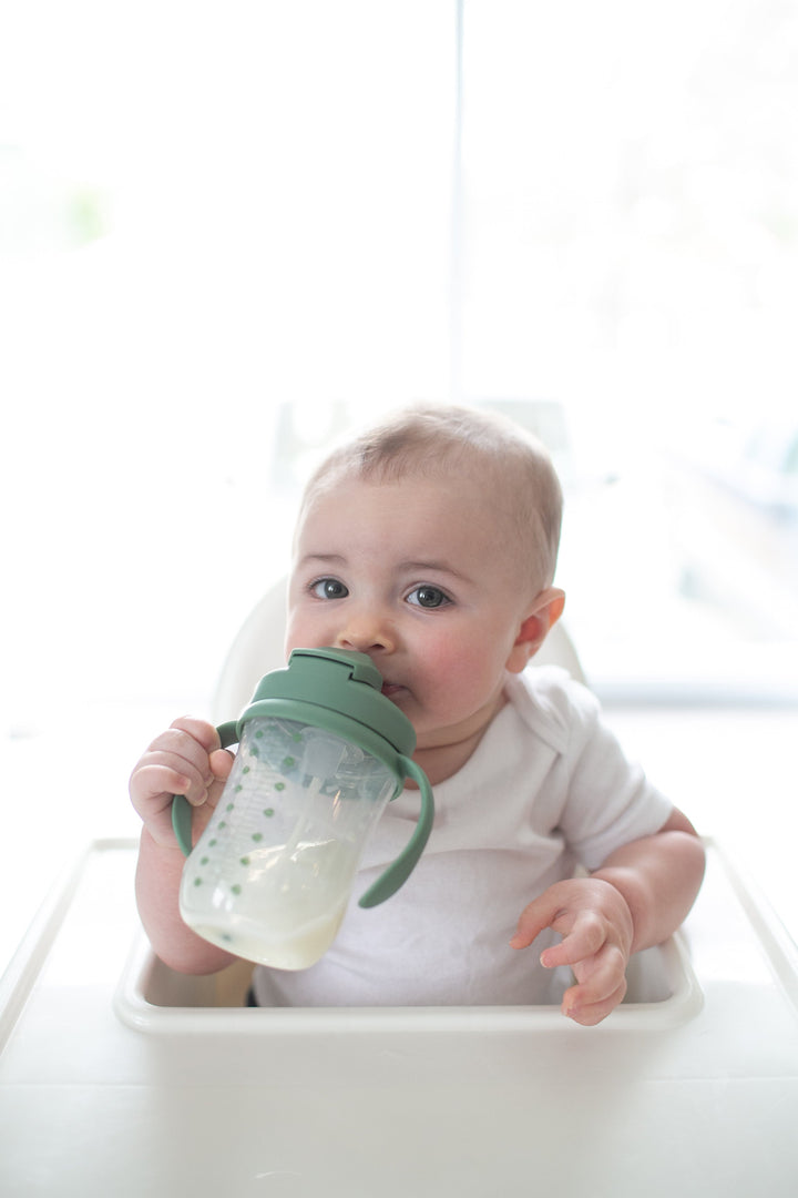 https://cdn.shopify.com/s/files/1/0659/5860/9120/files/Lifestyle_Babys_First_Straw_Cup_9oz_270ml_Olive_Green_1_5c9b4dc4-4c9b-46d0-a606-ab7210ecb949.jpg?v=1753428166
